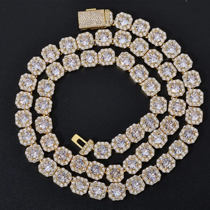 Golden 10mm square link hip hop chain with iced out zircon stones on black background