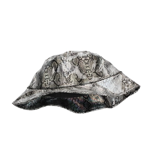 Fashionable snake print bucket hat featuring a glossy grey-black PVC texture and soft lining