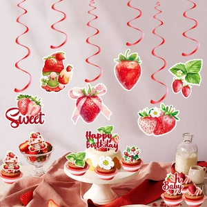 Strawberry theme party decor set with hanging swirls and festive cake toppers on dessert table