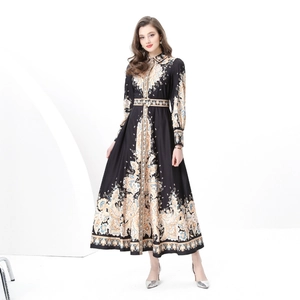 Vintage paisley print long sleeve maxi dress with waist belt and elegant flared hemline