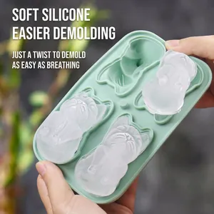 Light green silicone cat shaped ice cube mold with four flexible cavities for easy release