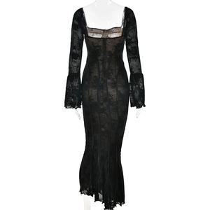Detail view of the back zipper and fish tail hem on this lace long sleeve dress