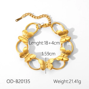 Detail view of gold butterfly bracelet with dimensions 18+4cm and 1.59cm width