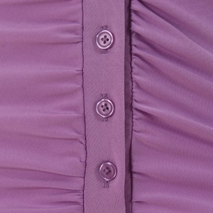 Close-up of purple knit dress featuring button-down front and ruched fabric detail