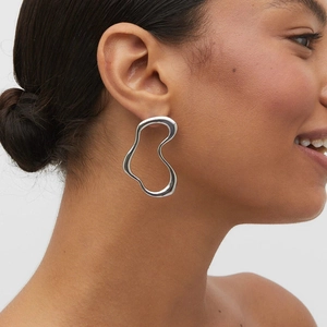 Silver irregular streamlined hollow earrings in minimalist titanium steel for women