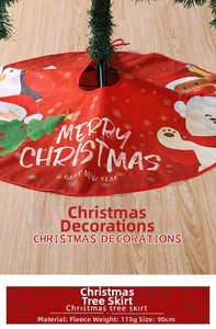 Detail of red plush 90cm Christmas tree skirt featuring penguin and reindeer patterns