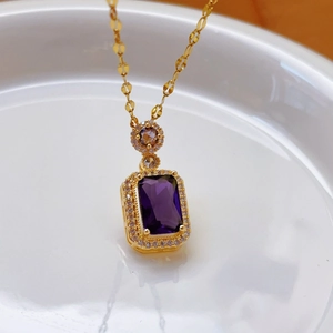 Luxurious gold titanium necklace featuring a rectangular purple zircon pendant with diamonds