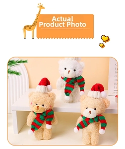 Close-up of cute plush Christmas bears with knit hats and scarves on display