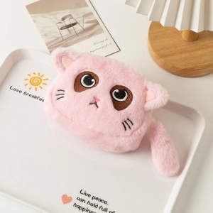 Detail of pink plush cat coin purse with embroidered feline face and soft furry tail