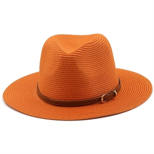 Classic orange straw fedora hat with brown leather band and wide brim for sun protection