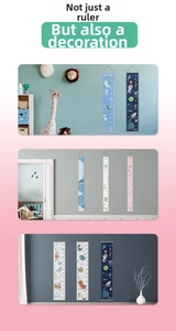 Close-up of canvas height chart with natural wood frame and cute cartoon animals