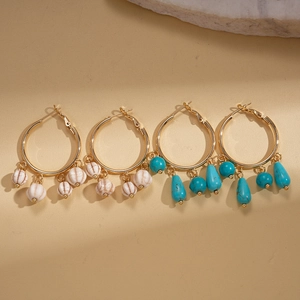 Bohemian gold hoop earrings set with turquoise and white marble stone charms