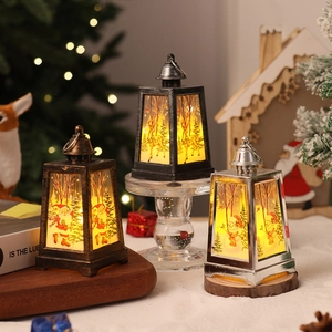 Christmas lantern with LED candle featuring Santa and reindeer prints for holiday decor