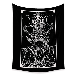 Detail view of The Moon tarot card tapestry featuring wolves and celestial goddess design
