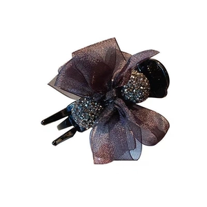 Elegant dark purple mesh bow hair claw clip with sphere rhinestone accents on white background