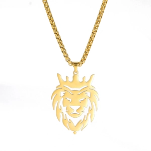 Golden hollow lion head pendant necklace with crown and box chain on white background