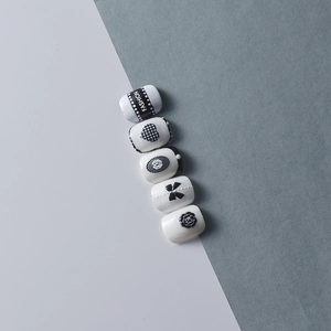 3D luxury rose nail stickers with black and white floral bows and fashion lettering