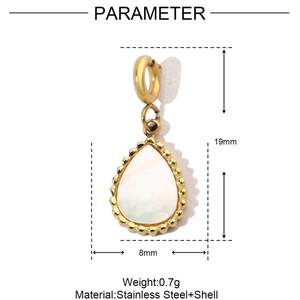 Detail of drop-shaped gold stainless steel earring with white shell inlay and measurements