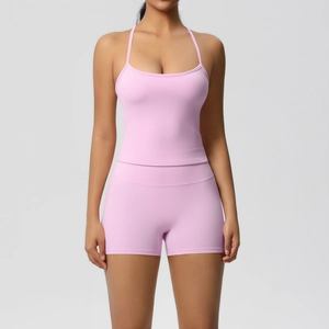 Detail view of pink high-stretch ribbed fabric for sports vest and athletic shorts