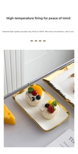 Close-up of a white rectangular ceramic plate with an irregular hand-painted gold rim