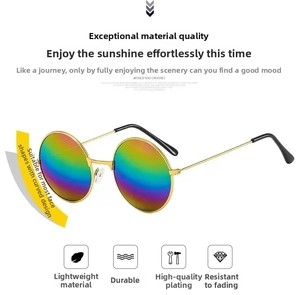 Detail of round metal sunglasses with gold frame and colorful iridescent gradient lenses