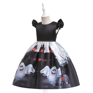 Detailed view of Halloween girl dress featuring ghost and haunted castle print patterns