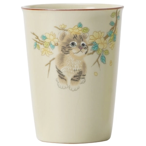 Ru-kiln beige ceramic tea mug with cute cat and floral illustrations in studio light