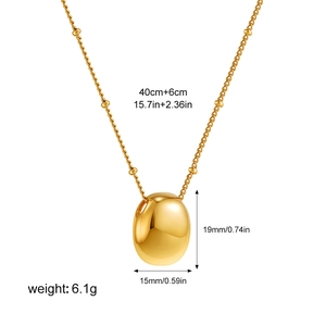 Detailed macro view showing the precise dimensions of this gold oval pendant necklace