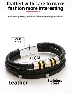Macro view of men's leather bracelet with stainless steel beads and magnetic buckle