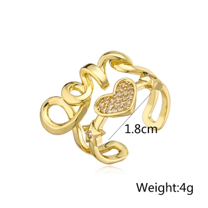 Detail shot of gold-plated Love heart ring showing 1.8cm diameter and 4g weight specs