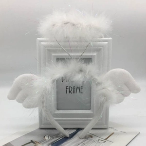 Close-up of white feather angel halo headband for holiday party cosplay hair accessory