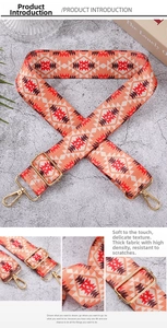 Detail of adjustable vintage geometric strap with gold lobster clasps and thick nylon fabric