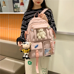 Zaino rosa in nylon impermeabile con graziosi accessori di peluche e tasca trasparente