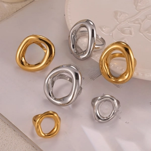 Minimalist organic geometric rings in gold and silver finish with molten lava design