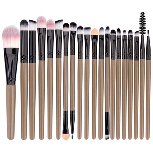 Detail of 20pcs professional makeup brushes with brown handles and pink gradient bristles