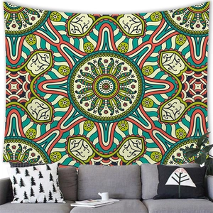 Detail of bohemian mandala tapestry featuring colorful symmetric geometric patterns