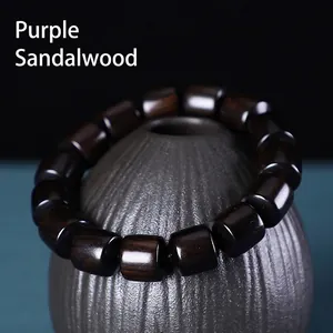 Handcrafted African Blackwood cylinder bead bracelet with natural wood grain and matte finish