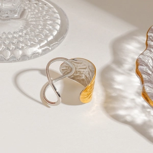 Hammered gold and silver bicolor stainless steel open ring with artistic light and shadow