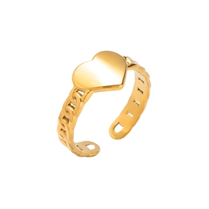 Macro detail of gold plated heart ring featuring smooth finish and chain style band