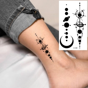 Waterproof temporary tattoo sticker with geometric moon and planet patterns on ankle