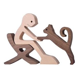 Detailed view of handcrafted wooden dog memorial figurine showing natural wood textures