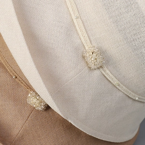 Japanese washi sun hat with elegant pearl embellishment and chic bicolor straw texture