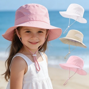 Kids quick-dry sun hat with mesh vents and chin strap shown in three beach colors