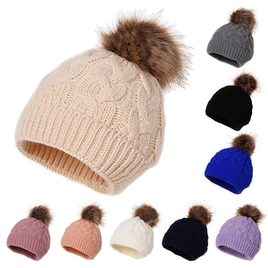 Winter knit pompom beanie for kids in nine colors including beige, navy and pink