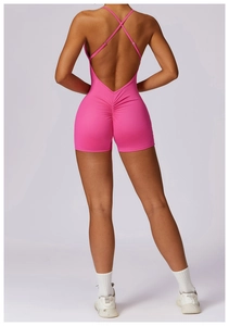 Pink one-piece bodysuit featuring cross-back straps and scrunch-butt lifting design details