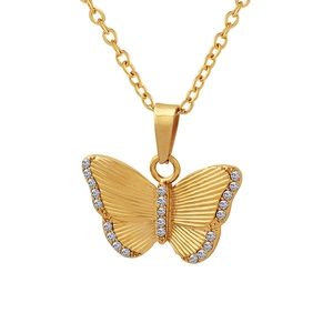 Elegant gold butterfly pendant necklace with zircon stones on a classic link chain
