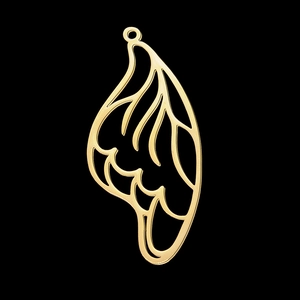Macro shot of gold hollow-out butterfly wing pendant in polished stainless steel