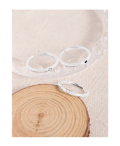 Detailed view of S925 sterling silver rings with Lucky engraving and heart smile design