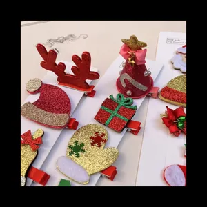 Set de barrettes à cheveux de Noël pailletées avec motifs renne et nœuds sur carte