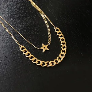 Double-layered gold titanium necklace featuring a hollow star pendant and Cuban chain